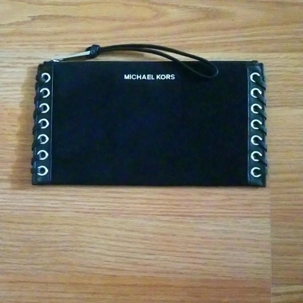 Michael Kors large black suede wristlet.